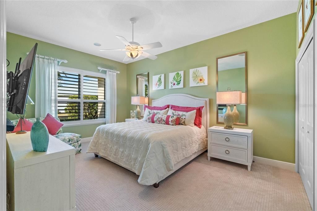 Inviting Guest bedroom is very roomy & sports two double closets.