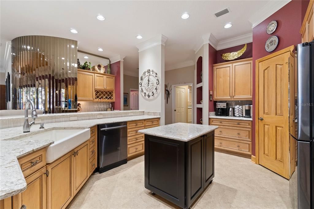 Kitchen with vinyl plank floors.