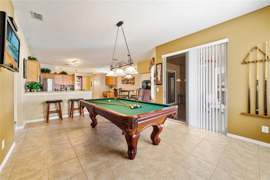 Spacious FAMILY ROOM is open to the kitchen.