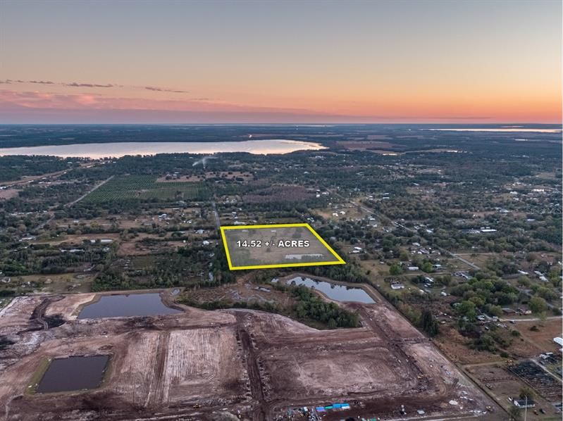 National builder development adjacent; get land while you still can! Lake Gentry in distance.