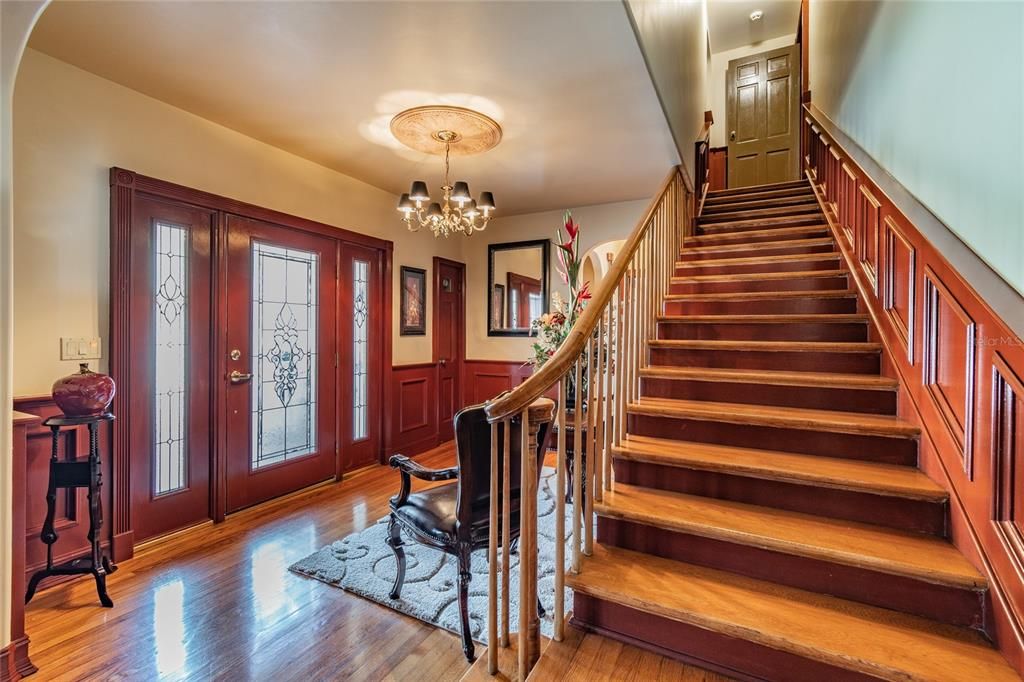 Beautiful stairwell in front entryway.