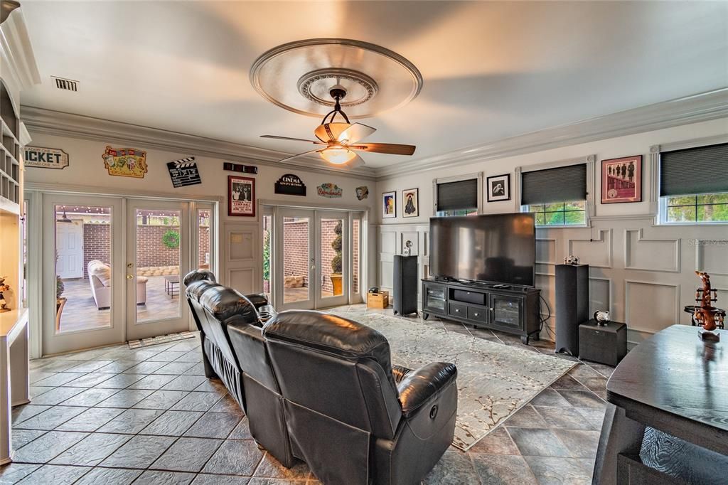 Large family room with French doors to patio.