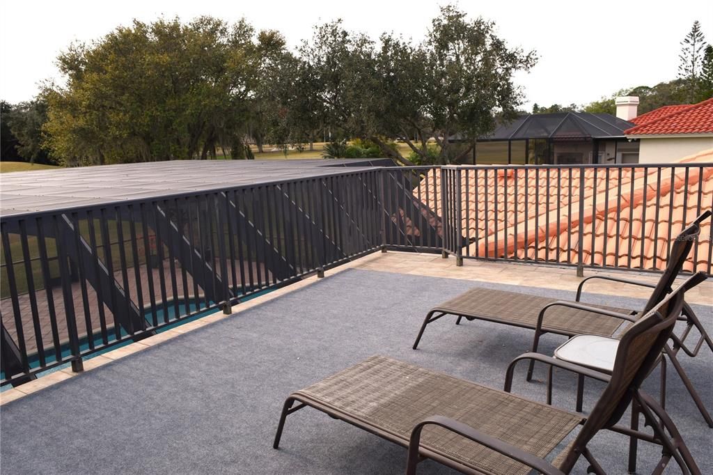 Upstairs private deck looking toward golf course