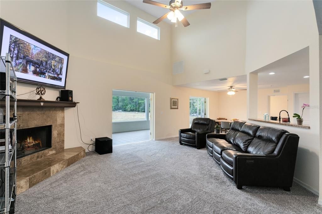 Soaring ceilings enhance the enjoyment of this family room