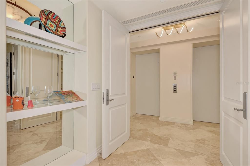 Private elevator to spacious foyer.