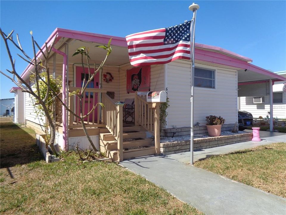 Inviting Sitting Porch * Enters Into the Family Room * Front En-suite Bedroom