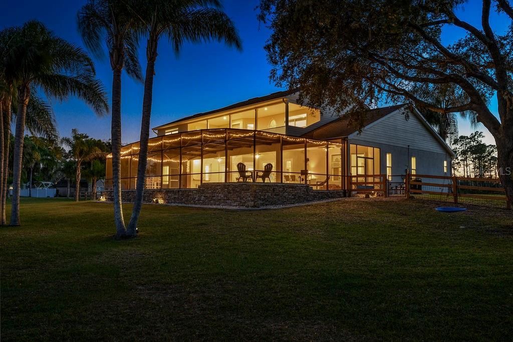 Rear view of home at dusk