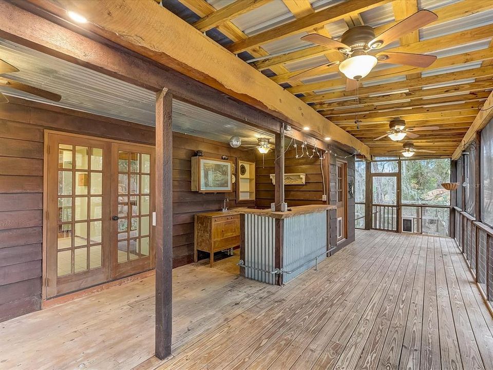 Screened porch with bar, sink and electricity