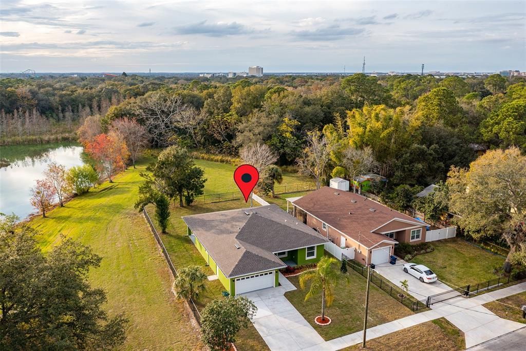 Aerial front to back- shows large beautiful area behind and around property.  Neighbors only on side.