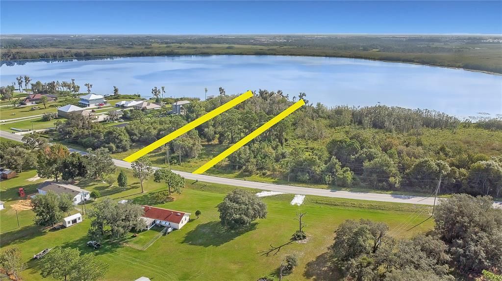 Hard to Find LAKEFRONT Lot! High & Dry, Buildable ONE AND A HALF ACRES of Lush, Treed Raw Land with 107 Feet of WATERFRONT on Gorgeous BONNET LAKE!  HOLY COW!