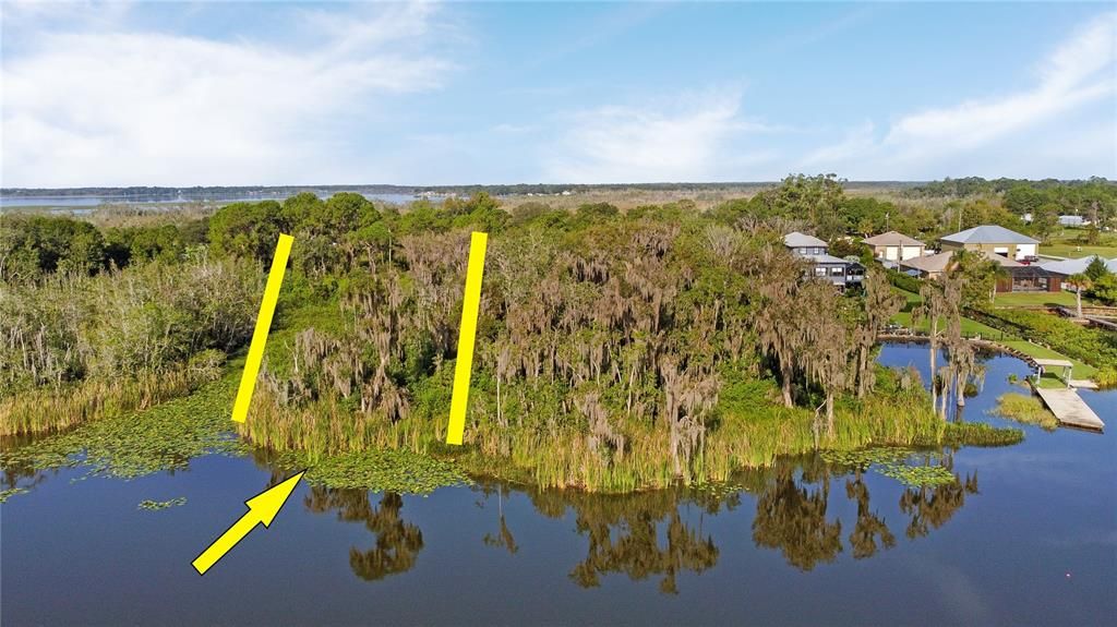 Land is 107 Wide at Road, 700 Feet Deep & has 100 Feet Frontage on Bonnet Lake. Lakefront Portion of Land has an Overgrown Dredged Canal Running into the Lot that You Will Be Able to See on the Aerial Pictures and Videos that Can be Cleared Back, Just Like the Lakefront Homes starting 4 Lots to the North.