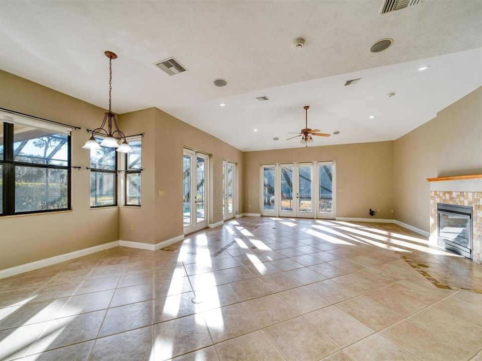 Family Room Overlooks the Pool Area and Private Wide Open Green Spaces