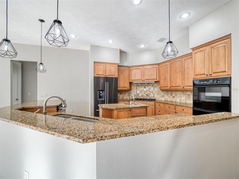 Maple Cabinets, Granite Countertops, and KitchenAid Appliances (Gas Cooktop!)