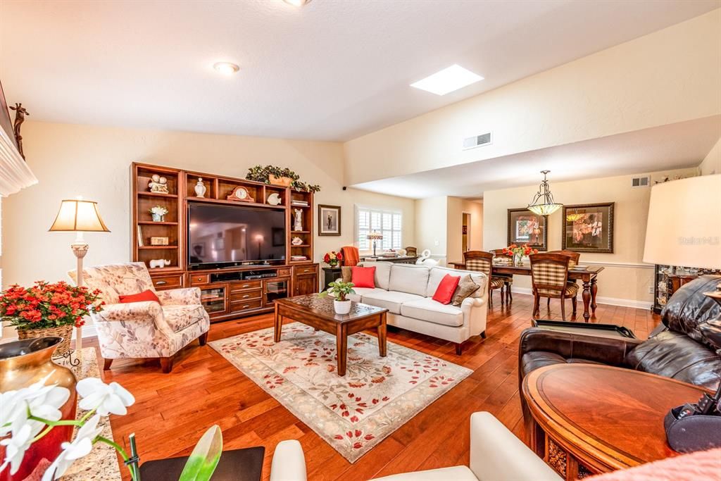 OPEN LIVING and DINING feature the HAND SCRAPED HARDWOOD floors that run throughout!