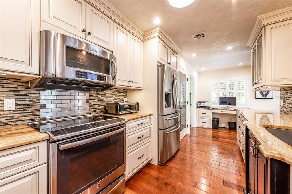 CUSTOM KITCHEN with solid wood cabinets with an extra 3” depth and custom BUILT-INS!