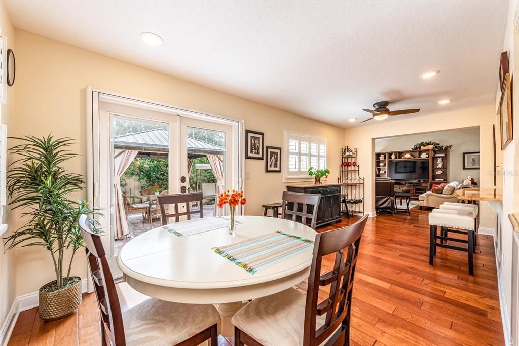 Breakfast bar and dinette that looks out onto the garden via FRENCH DOORS for casual dining!