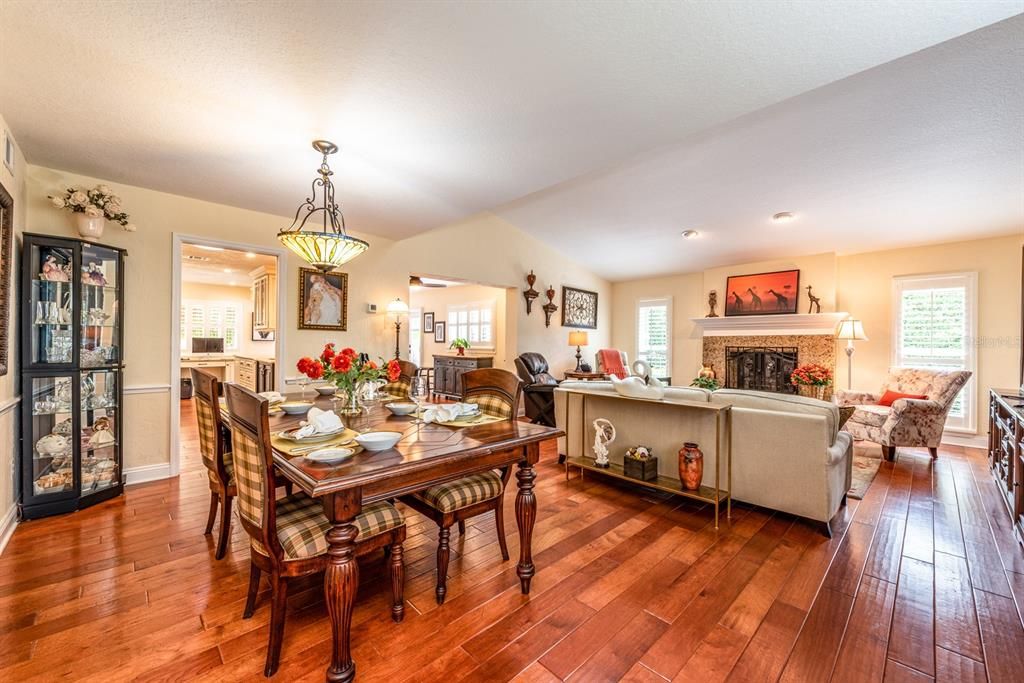 OPEN LIVING and DINING feature the HAND SCRAPED HARDWOOD floors that run throughout!