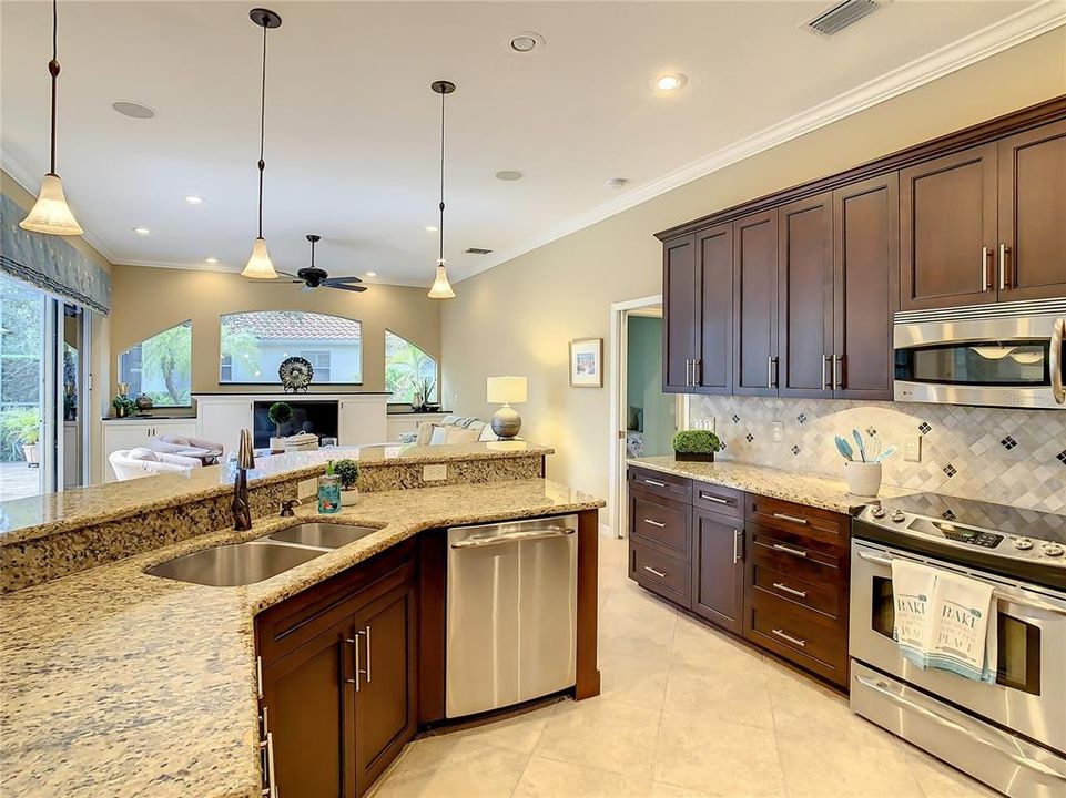 Open kitchen to family room and dinette area make this room feel even bigger