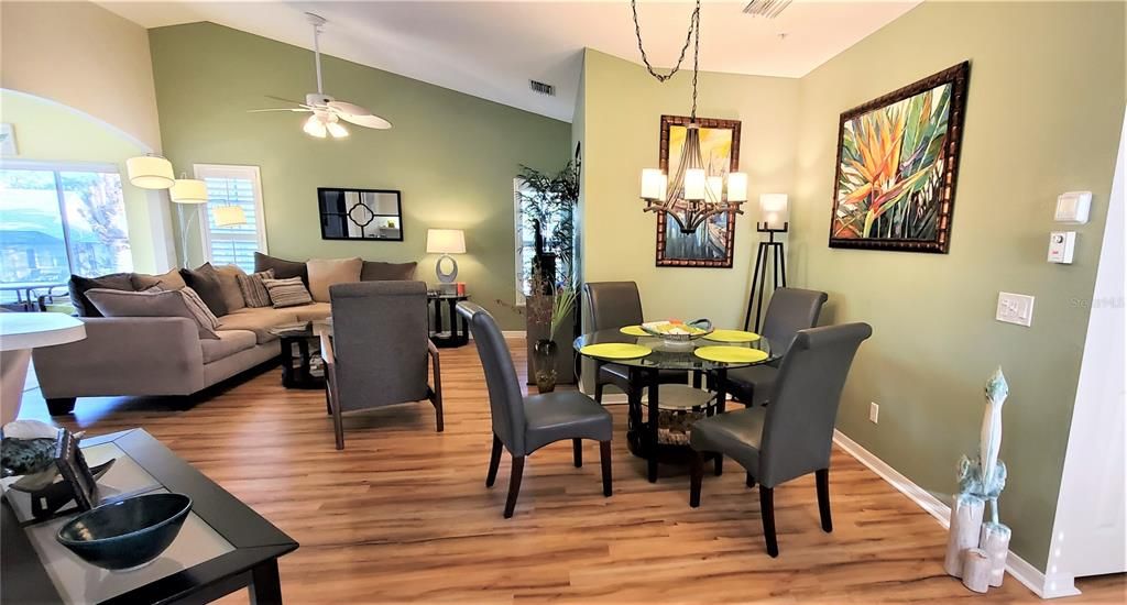 Open Living Area has additional dining area and vaulted ceilings.