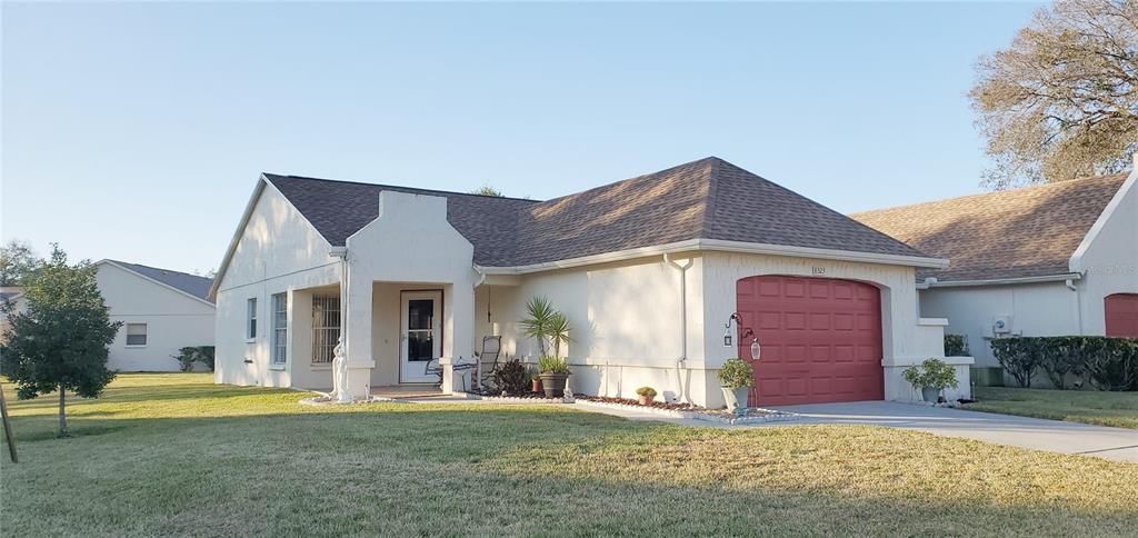 8323 Monaco Drive sits on a corner lot in the adult community of Timber Oaks.