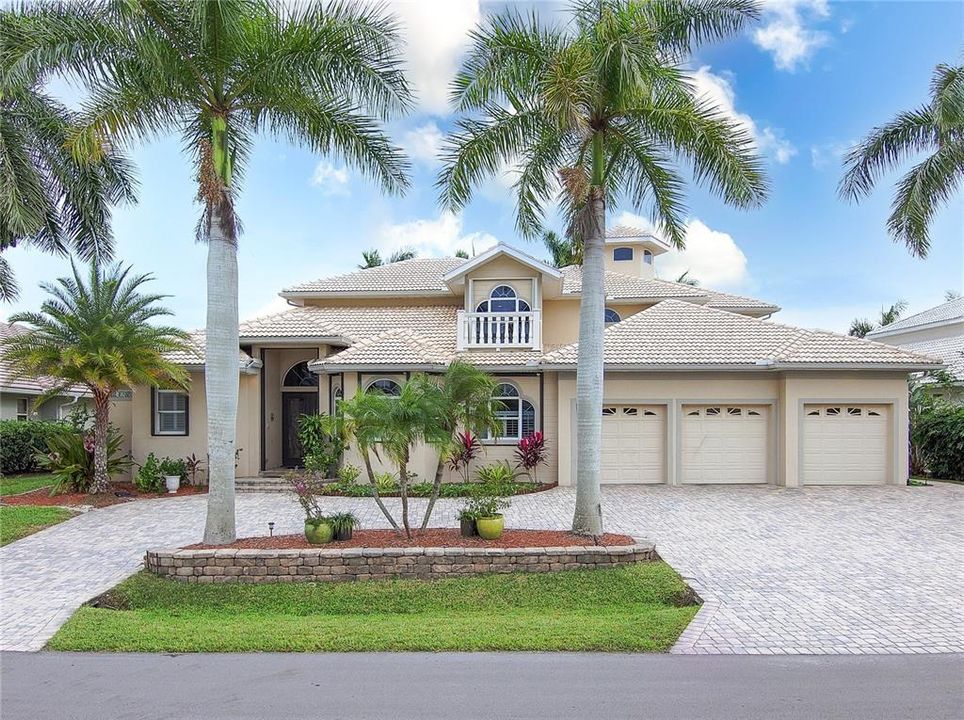 GORGEOUS 4 BEDROOM, 4.5 BATH, 4-CAR GARAGE WATERFRONT POOL HOME WITH QUICK SAILBOAT ACCESS TO CHARLOTTE HARBOR LEADING TO THE GULF OF MEXICO!