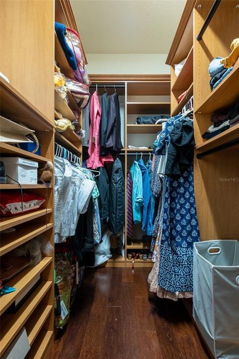 First floor owner retreat closet with custom shelves
