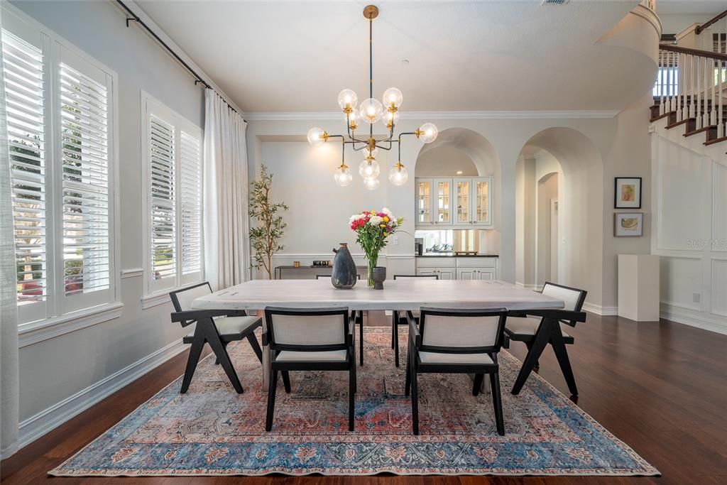 Expansive dining room is connected to the formal room