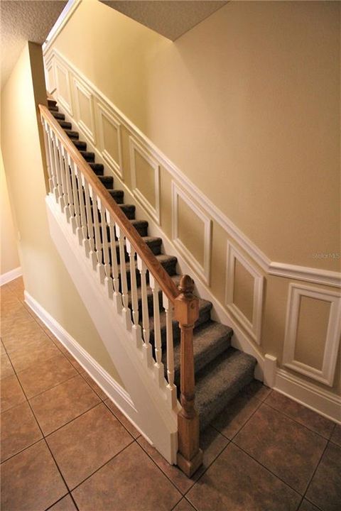 Stairs to upstairs bonus room and bathroom
