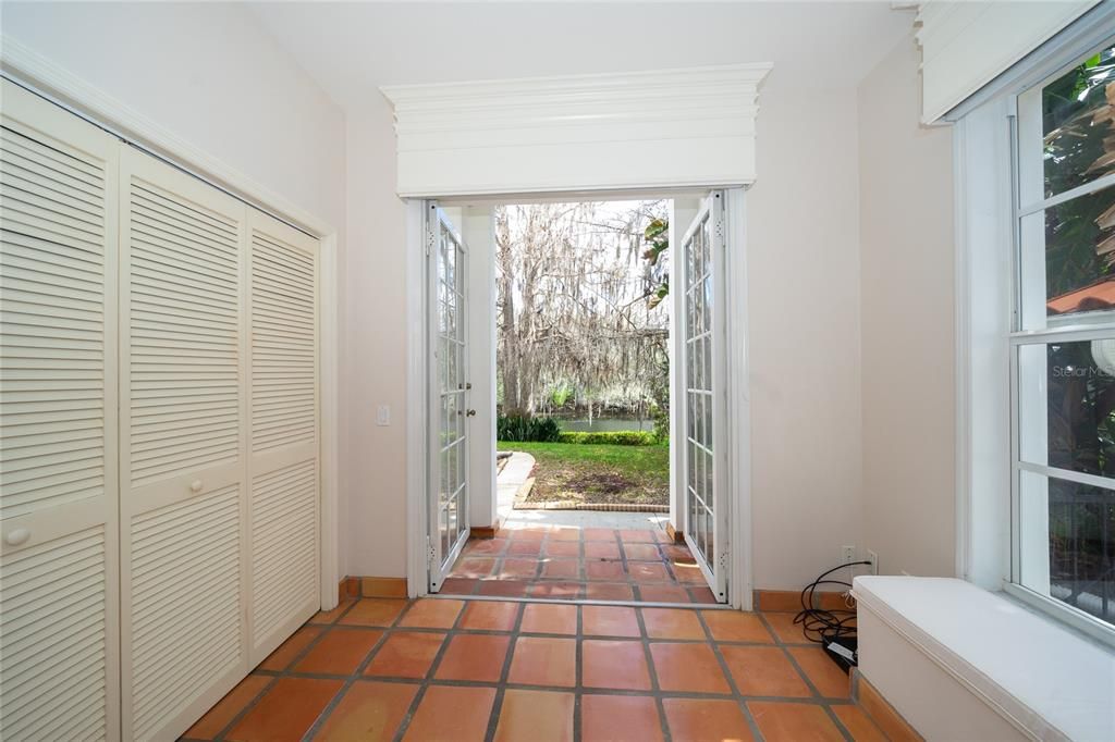 bedroom with window seat open to nature at it's best