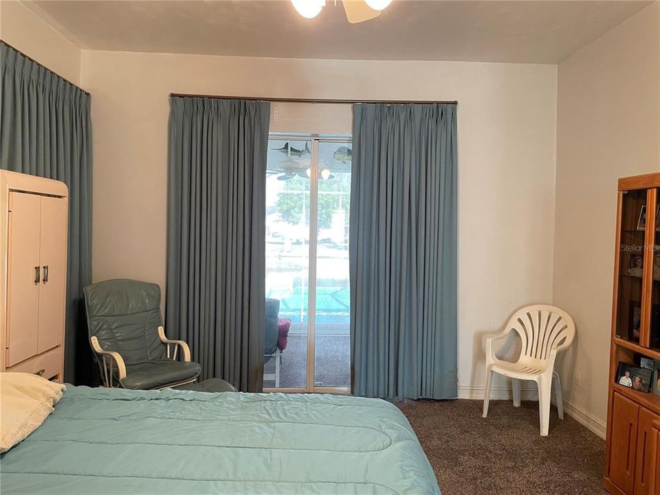 Master Bedroom leads out to pool