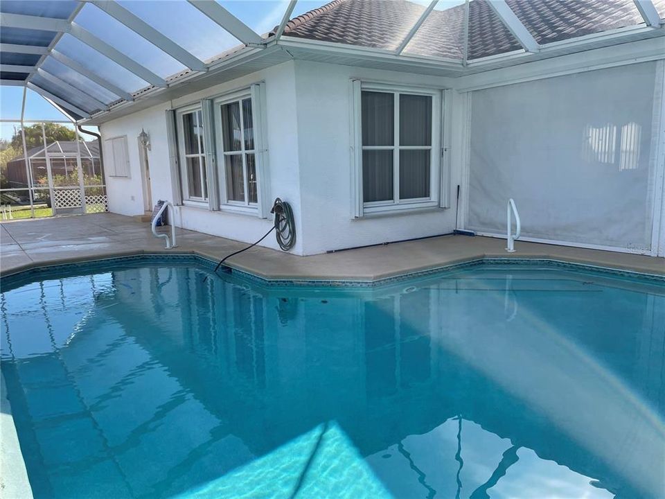 Pool and large screened in patio