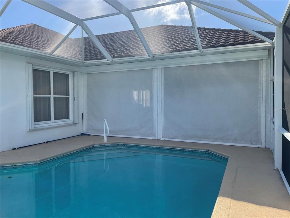 Pool View with Hurricane shades down