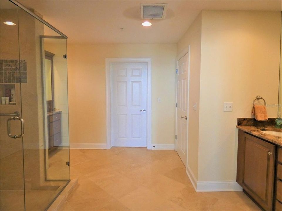 VERY LARGE OWNER'S BATH WITH DRAMATIC GLASS SHOWER