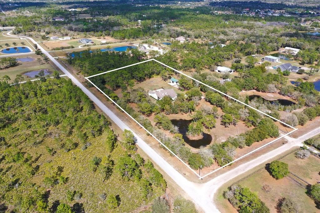 Nearly 5 acres privately gated/ fenced Estate