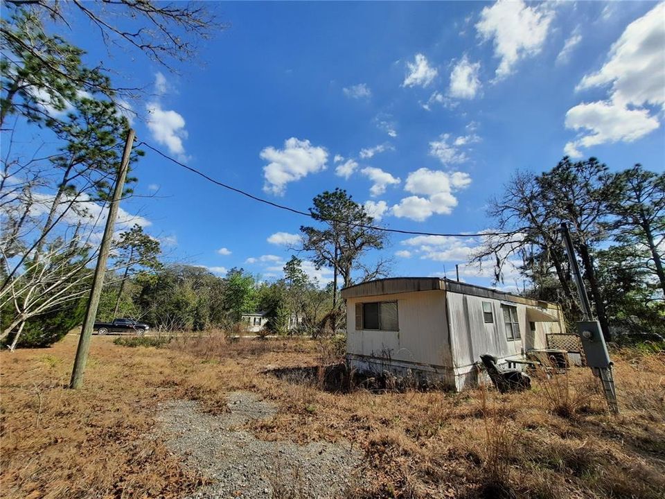 North side and back of mobile looking toward road