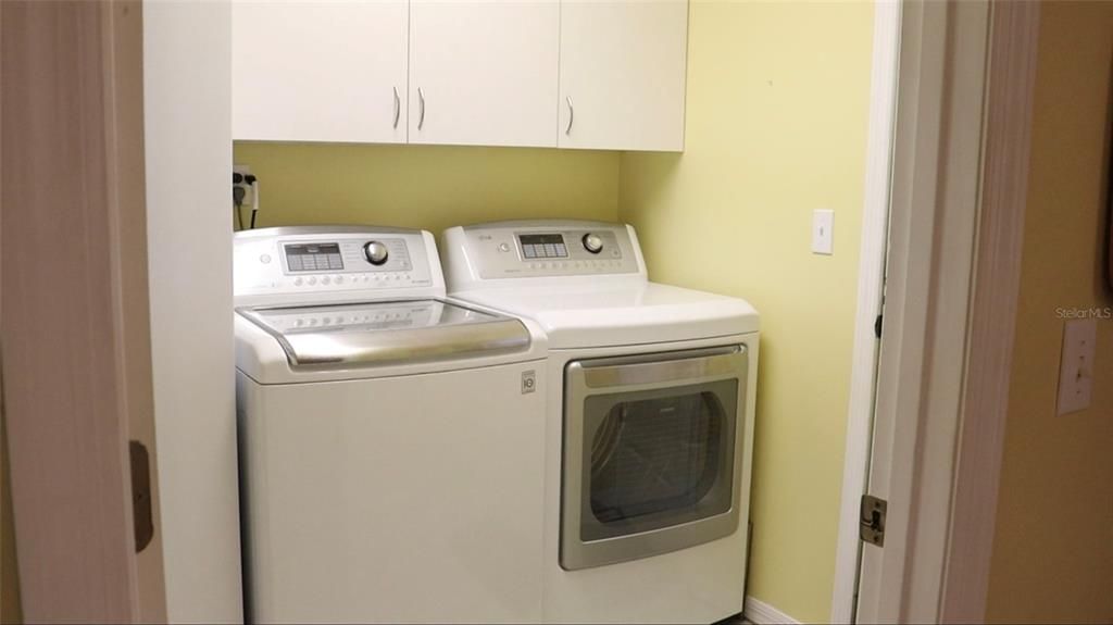 Laundry Room w/AC unit & Water Heater