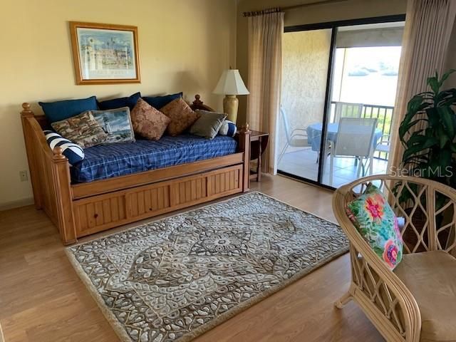 Guest bedroom with private entry to lanai.