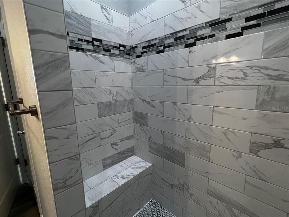 Master Walk in Shower with bench seat