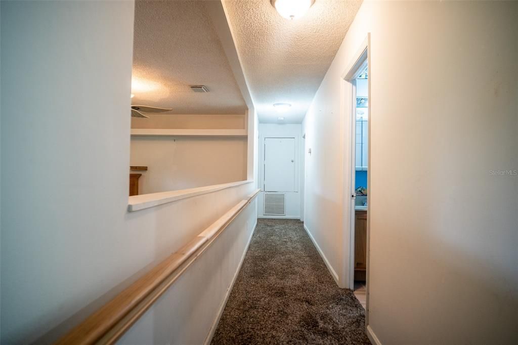 Hallway to master and bedroom 3