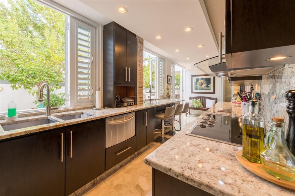 Kitchen Windows Open to View Patio