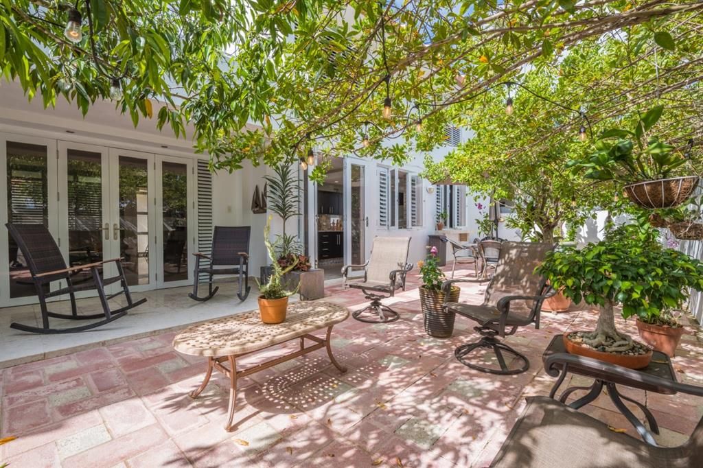 Patio accessed from Kitchen & Family Rooms