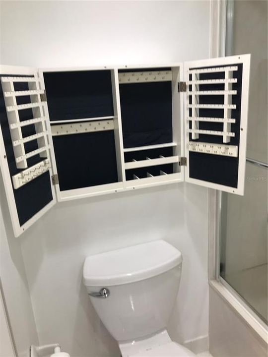 Owner's Bath with Built in Wall Jewelry Armoire