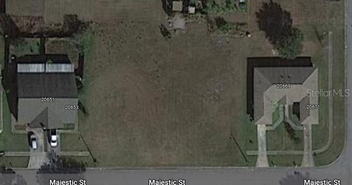 LOT 11 is to the left of the property on the right side of image.