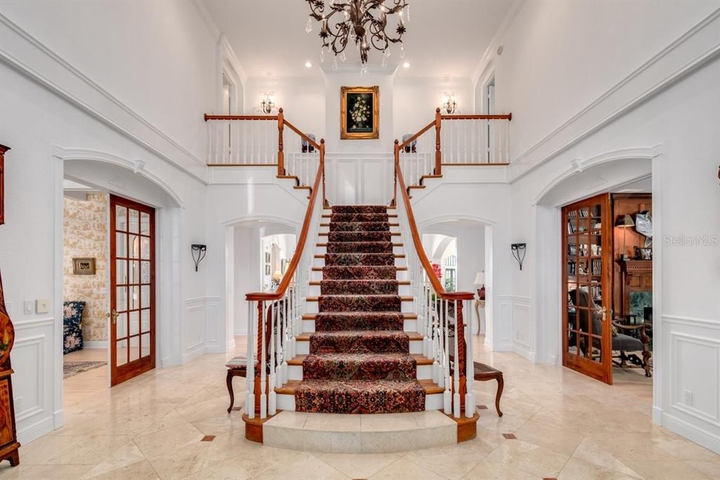 Grand Staircase with 20' ceilings