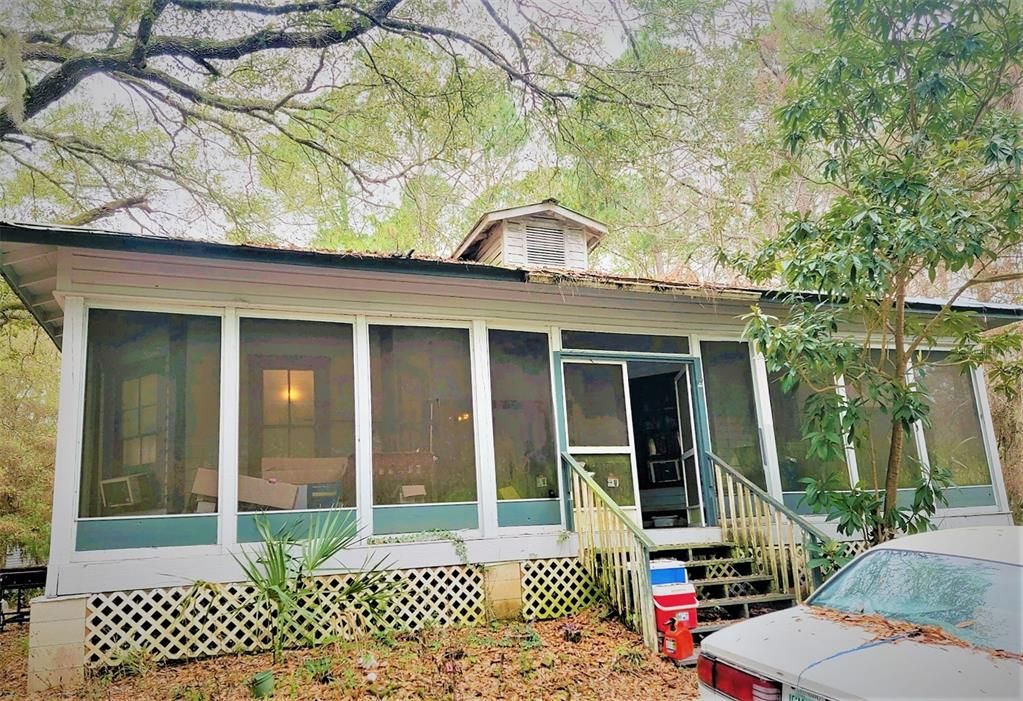 FRONT MAIN ENTRANCE & SCREENED FRONT PORCH