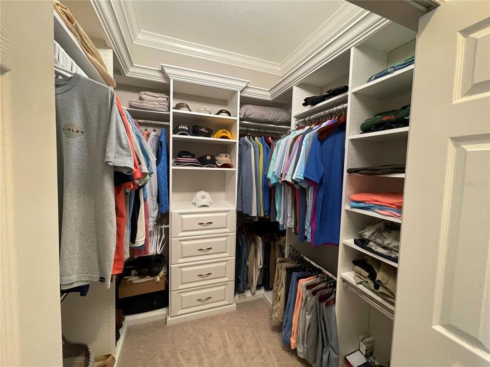 Custom Closets are found throughout the home - this is one of the closets in the master.