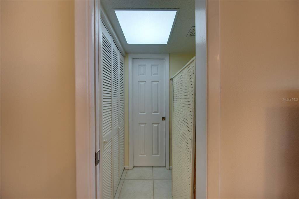 The guest bedroom also has its own closet space in the hallway that connects both bedrooms.