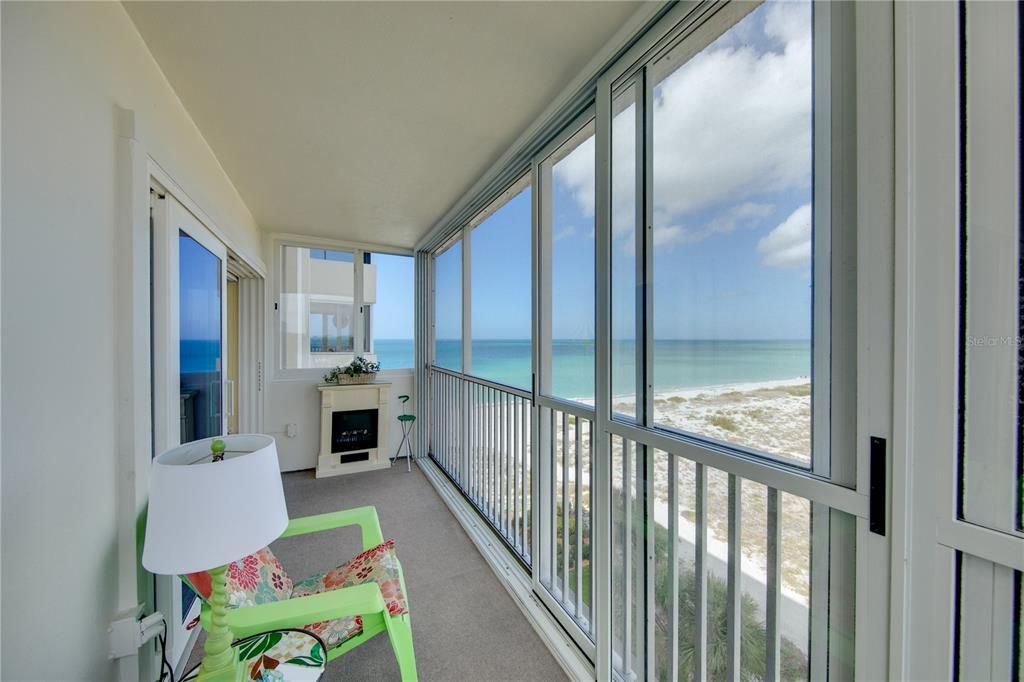 The rear lanai provides sweeping views of the Gulf and over the city.