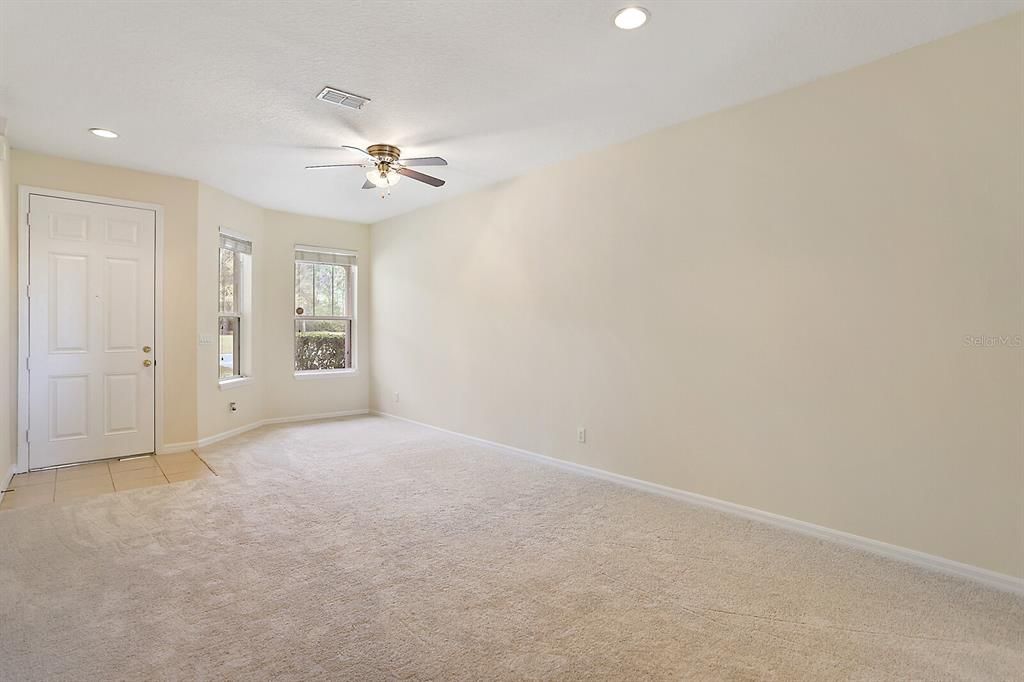 large living/dining space as you walk in to the home-BRAND NEW CARPET