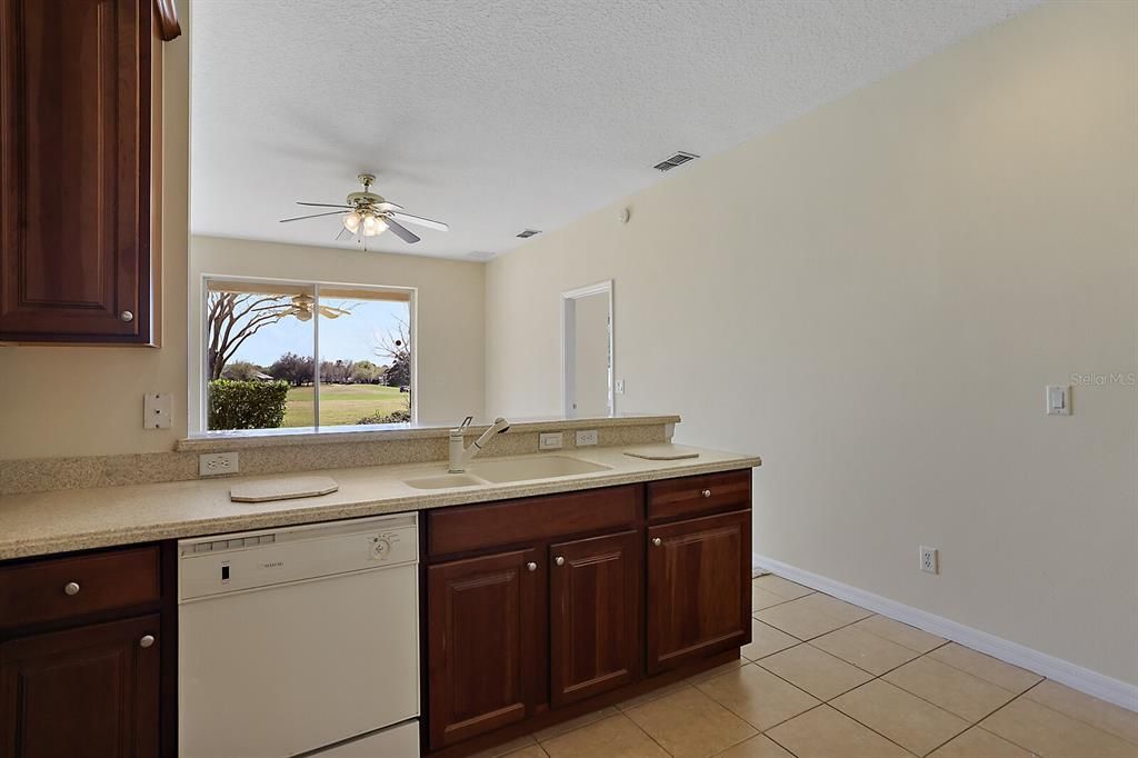 Tile floors in kitchen and views of the golf course